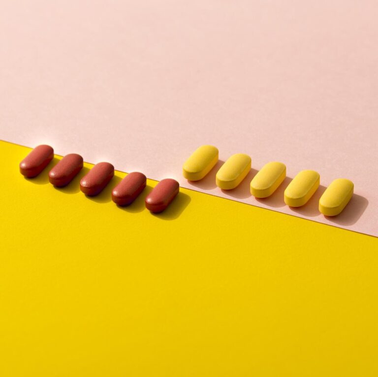 differently colored pills in rows
